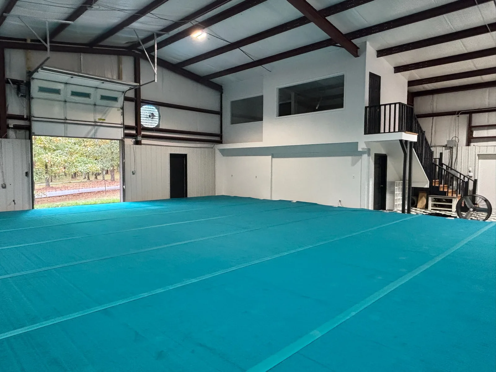 Bloom Cheer & Tumbling gym floor and elevated parent viewing room in Hot Springs, Arkansas