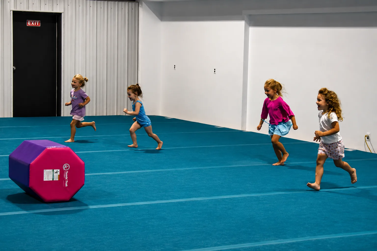 Young athletes enjoying a group cheer and tumbling class at Bloom Cheer and Tumbling in Hot Springs, Arkansas